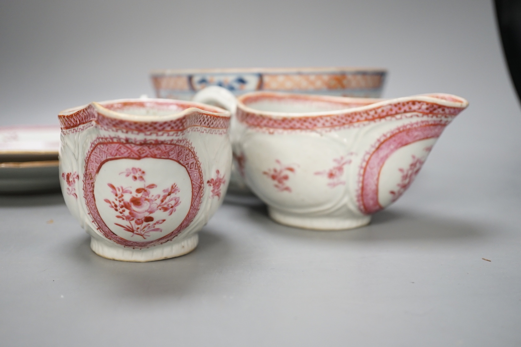 A group of 18th century chinese export: two plates, two sauceboats, a bowl and a tea bowl